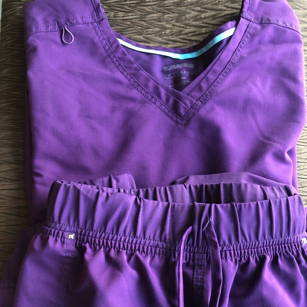 Gently used Scrub Star Set. Eggplant color.